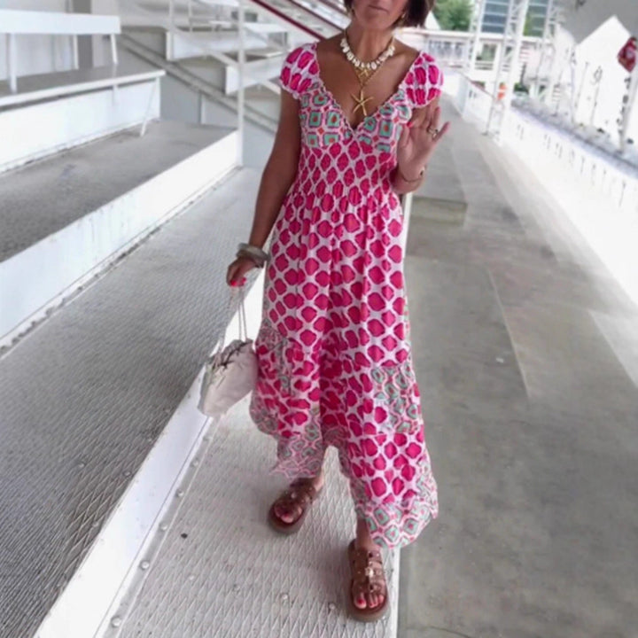 Women’s summer tiered dress with smocked top, V-neckline and puff sleeves StylebySassy
