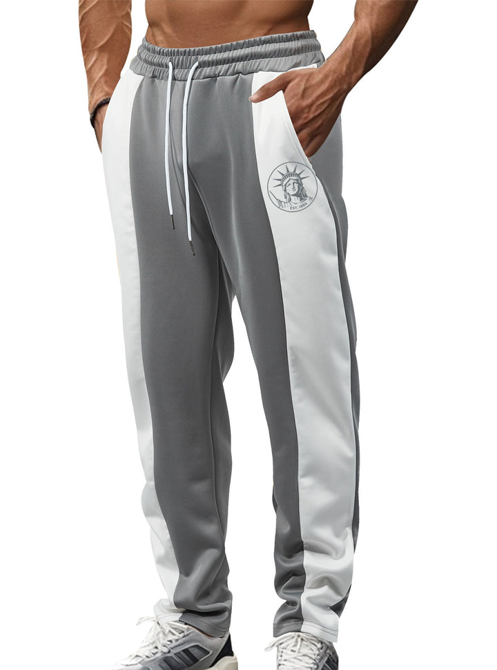 Men's sporty track pants with side contrast stripes, elastic waistband, drawstring, and deer embroidery StylebySassy