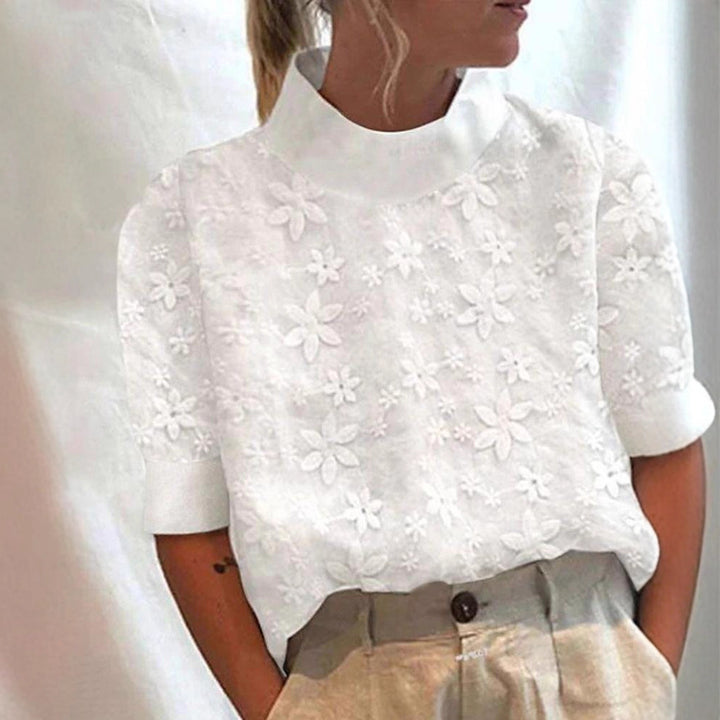 Women's embroidered short-sleeve blouse with stand-up collar and three-dimensional flower appliqué StylebySassy
