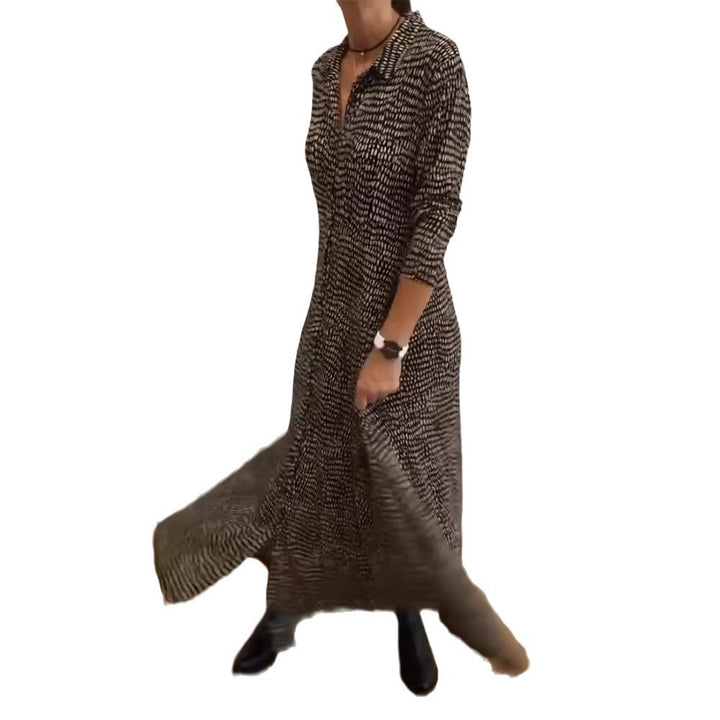 Ladies' flowing maxi dress with shirt collar, half-length sleeves, and side pockets StylebySassy