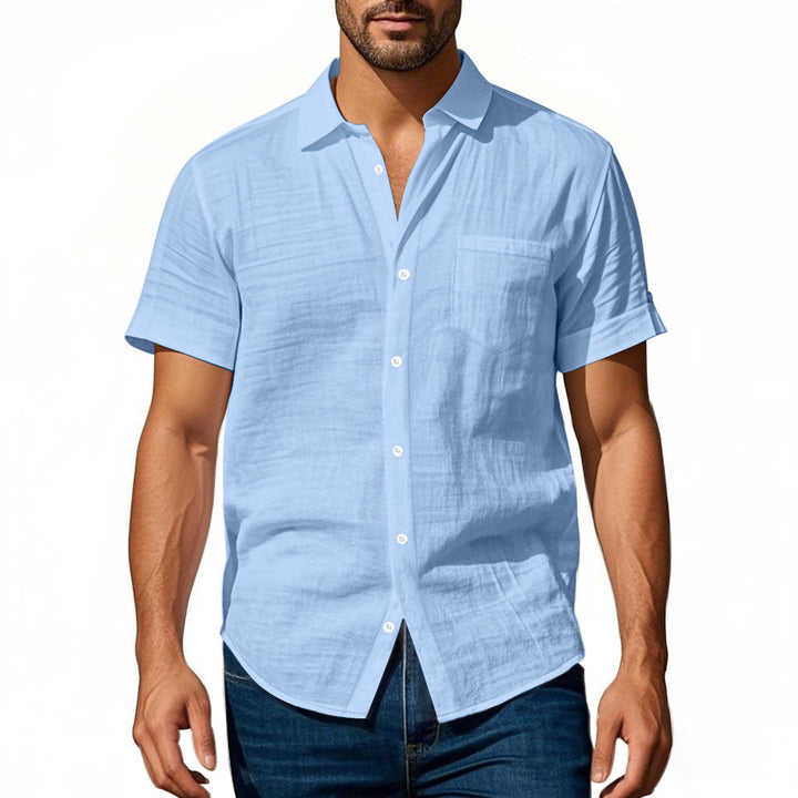 Men's short-sleeved casual shirt made of linen blend with chest pocket and rounded hem StylebySassy
