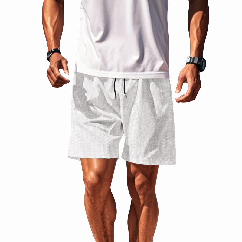 Men's two-layer swim shorts with integrated compression inner shorts and hidden cell phone pocket StylebySassy