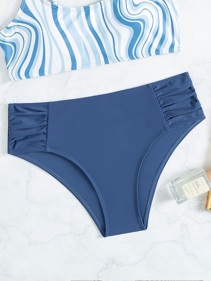 Women's swimsuit set with stylish striped top and high-waisted bottom StylebySassy