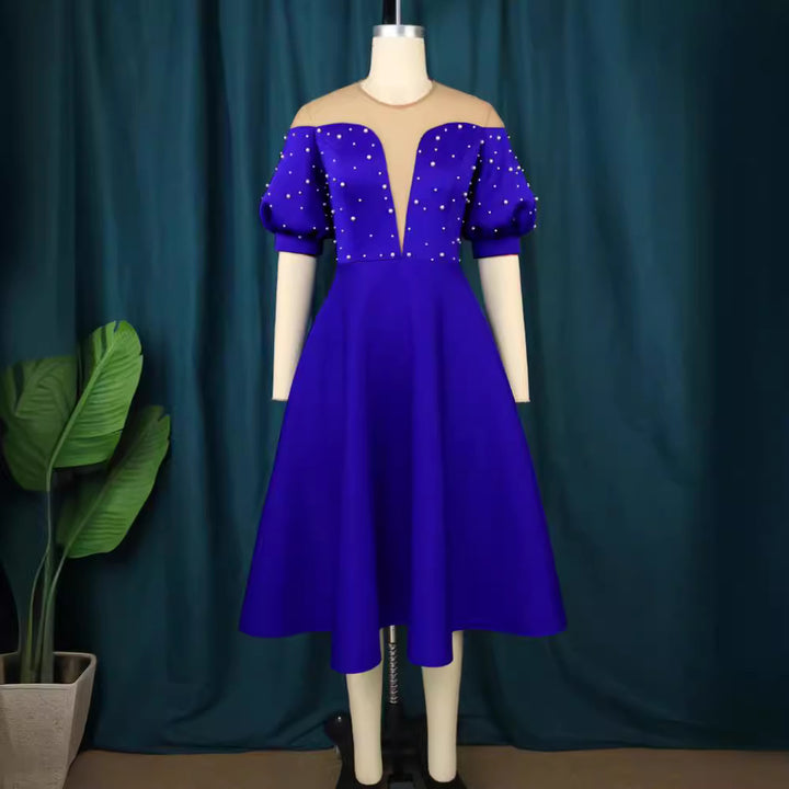 Women's festive midi dress with ruffled sleeves and shimmering accents StylebySassy