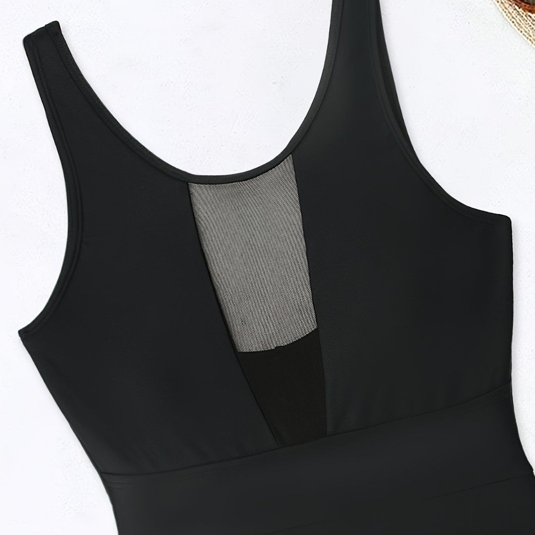 Women’s sporty jumpsuit with deep V-neckline and transparent mesh details StylebySassy
