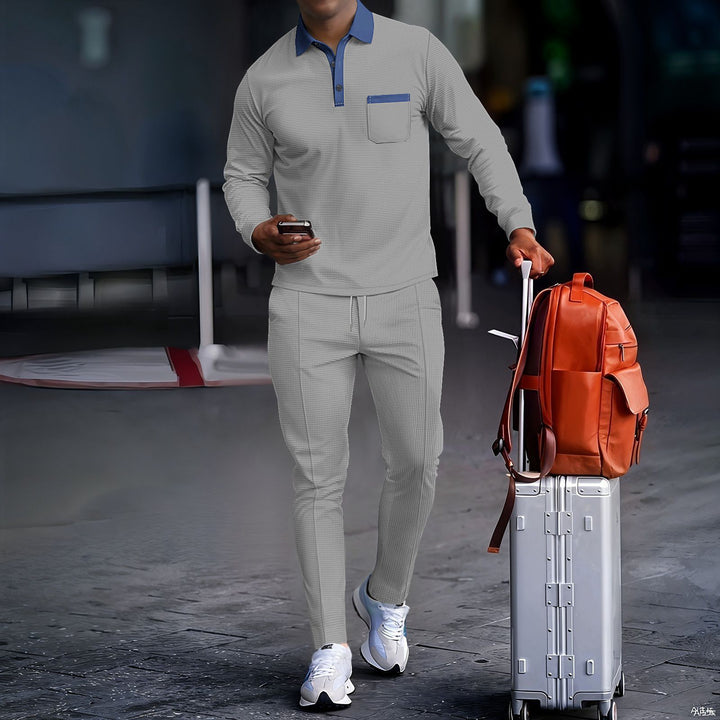 Men's travel set made of structured jersey with long sleeve polo shirt, chest pocket, and slim fit drawstring pants StylebySassy