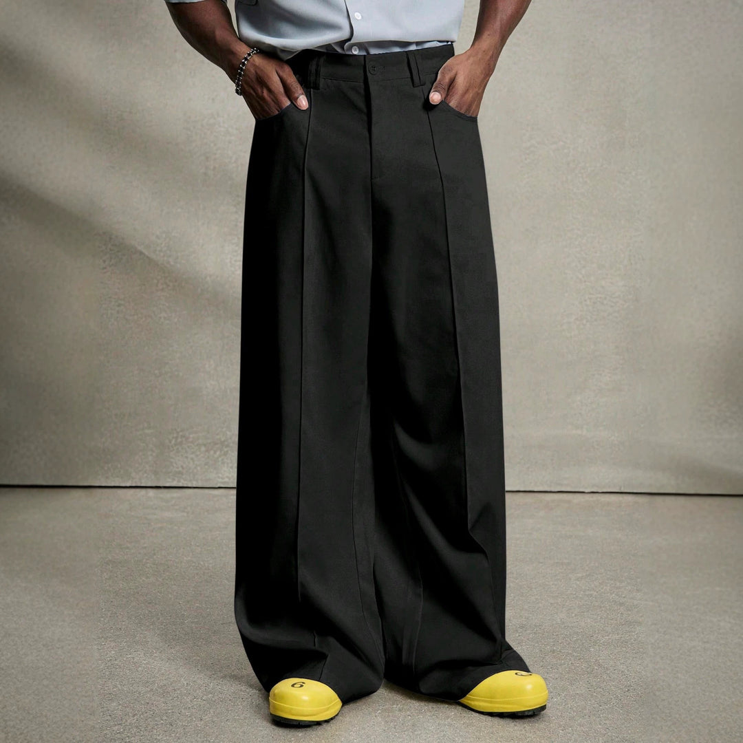 Men's wide pleated pants with high waistband, precise creases, and side inset pockets StylebySassy