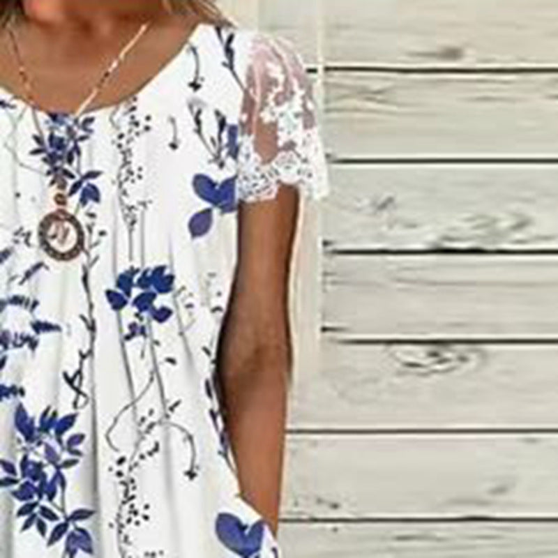 Ladies' airy A-line midi dress with lace sleeves, side pockets, and round neckline StylebySassy