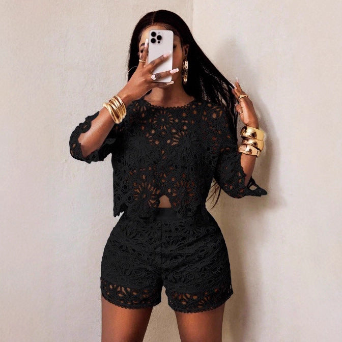 Women's airy crochet two-piece set with floral lace, short top and high-waisted tailored pants StylebySassy