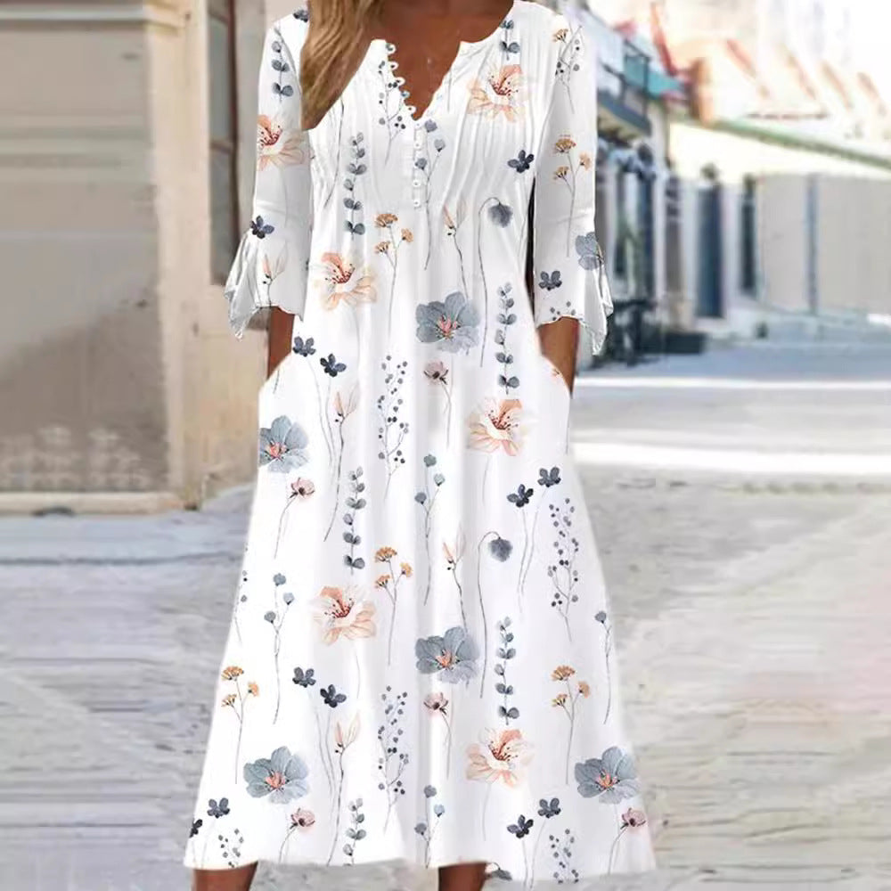 Women flowing midi dress with V-neck, decorative button placket, chest pleats, bow sleeves and side pockets StylebySassy