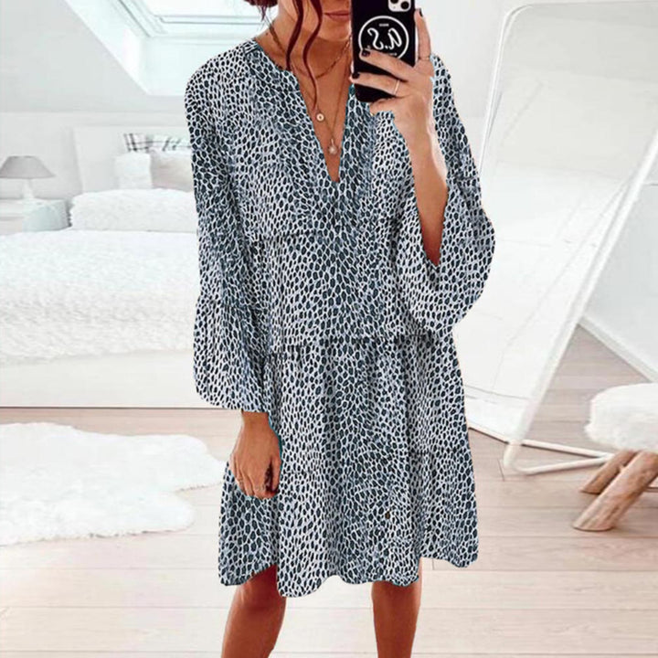 Women's cropped A-line tunic dress with deep V-neck, tiered skirt, and wide batwing sleeves StylebySassy