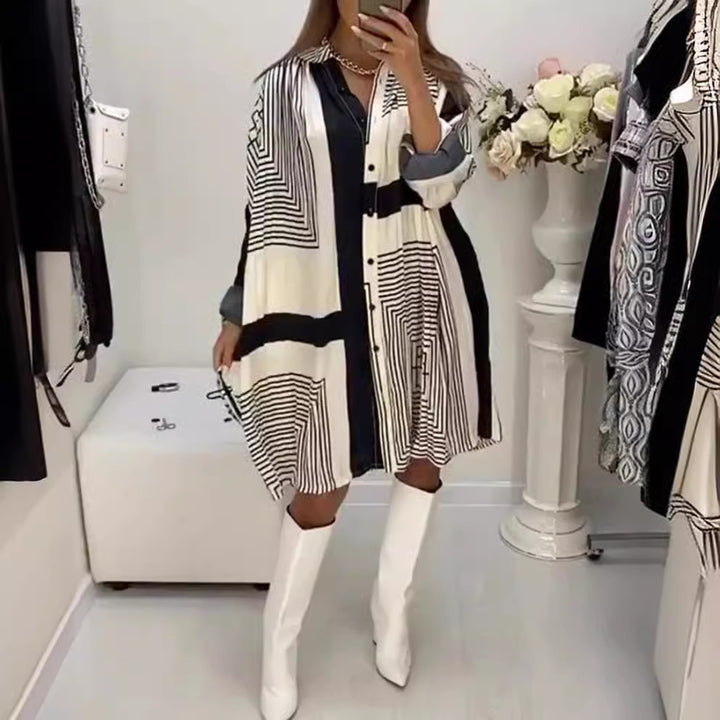 Women's knee-length A-line shirt dress with graphic line print, concealed button placket, and oversized cuffs StylebySassy