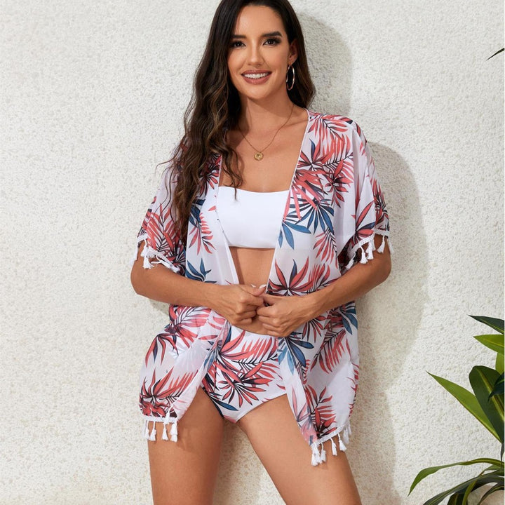 Ladies elegant beach outfit with floral cover-up and matching bikini StylebySassy