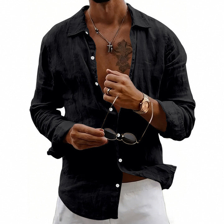 Men's airy relaxed linen shirt with open lapel, rounded hem, and roll-up sleeves StylebySassy