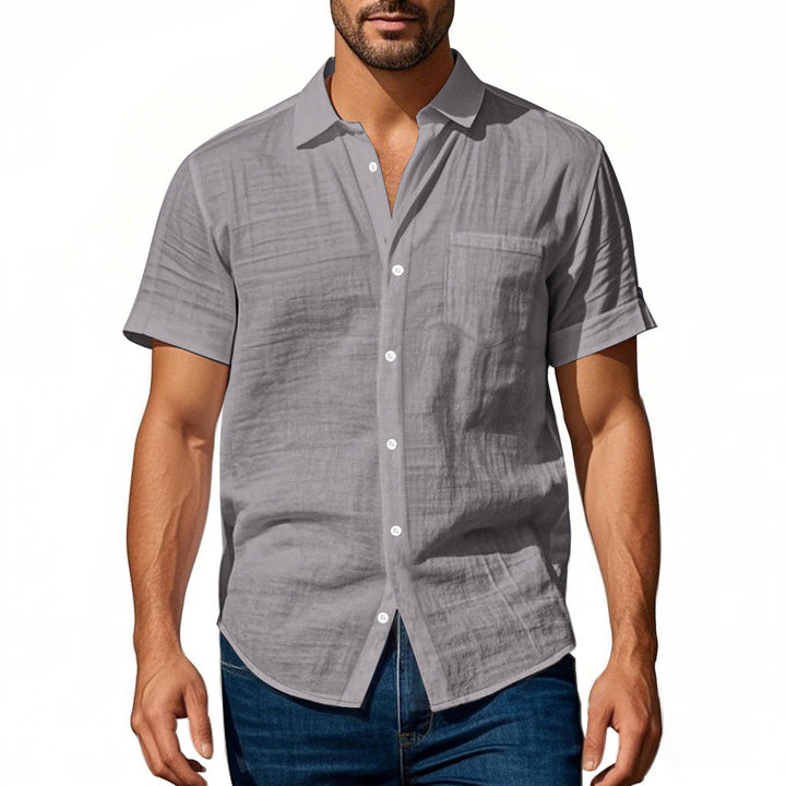 Men's short-sleeved casual shirt made of linen blend with chest pocket and rounded hem StylebySassy