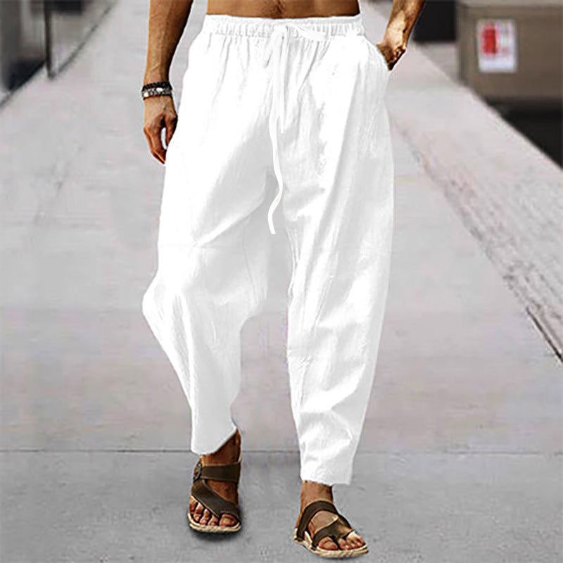 Men's relaxed summer slouch pants made of linen blend with elastic waistband and tapered ankle cuffs StylebySassy