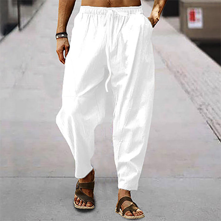 Men's relaxed summer slouch pants made of linen blend with elastic waistband and tapered ankle cuffs StylebySassy