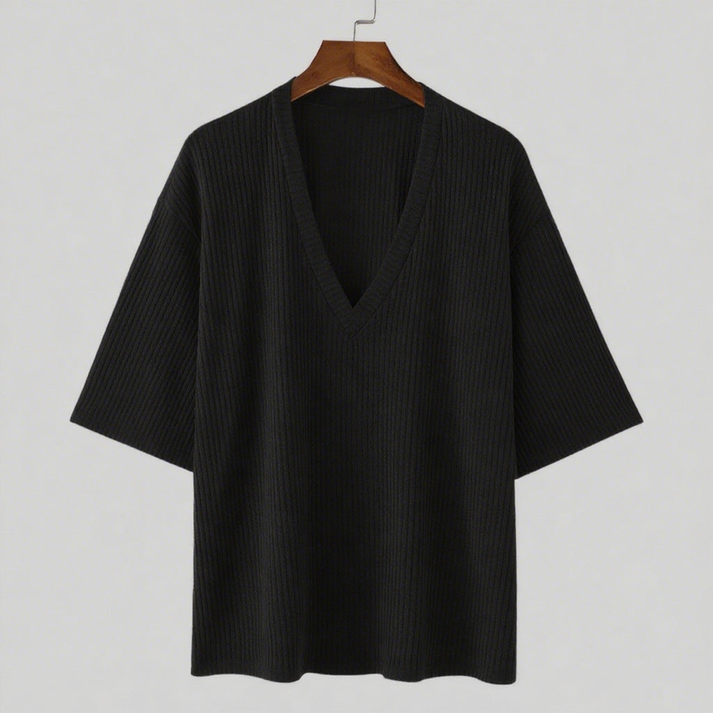 Women's oversized V-neck knit top with textured ribbed look and half-length sleeves StylebySassy