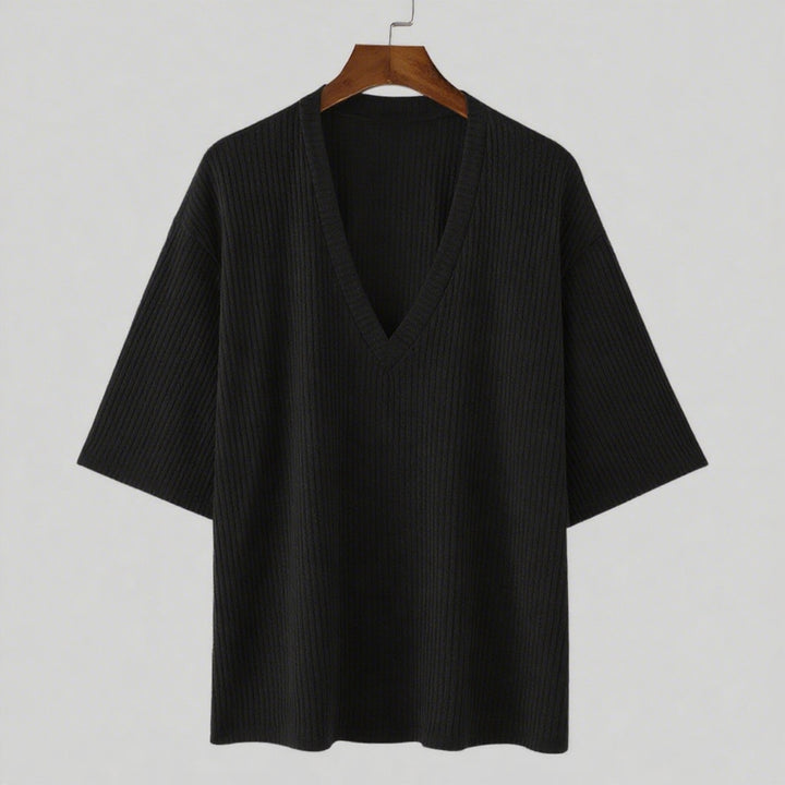 Women's oversized V-neck knit top with textured ribbed look and half-length sleeves StylebySassy