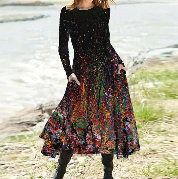 Women's A-line midi dress with abstract spray pattern, round neckline, long sleeves and side pockets StylebySassy