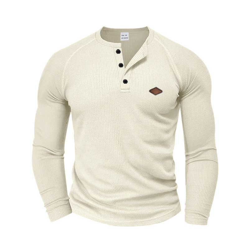 Men's structured waffle Henley shirt with short button placket, raglan sleeves, and leather patch StylebySassy