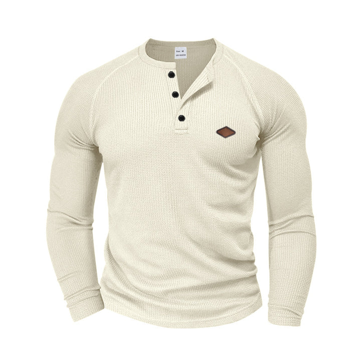 Men's structured waffle Henley shirt with short button placket, raglan sleeves, and leather patch StylebySassy
