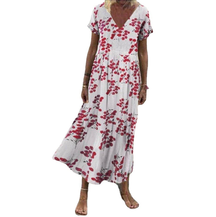 Women’s V-neck maxi dress with fine pleated skirt, empire bodice and short sleeves StylebySassy