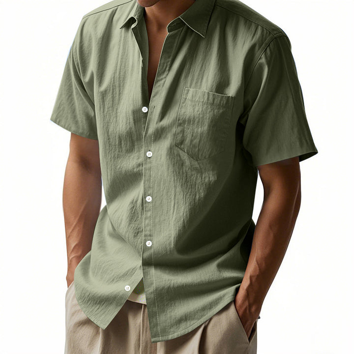 Men's short-sleeved textured shirt made of breathable slub linen with a spread collar, chest pocket, and straight hem StylebySassy