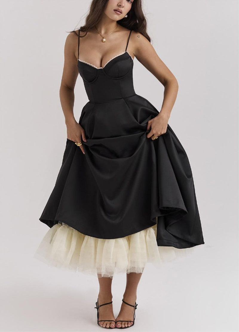 Ladies nan bustier dress with shaped bodice, soft flared skirt, integrated tulle underlay and side pockets StylebySassy
