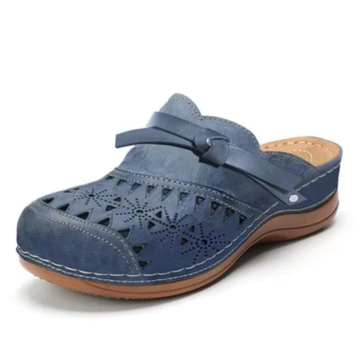 Women Comfortable Clogs with delicate cut-out design and elegant strap StylebySassy
