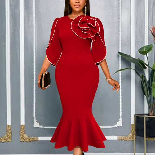 Ladies fitted evening dress with peplum and voluminous ruffle design StylebySassy