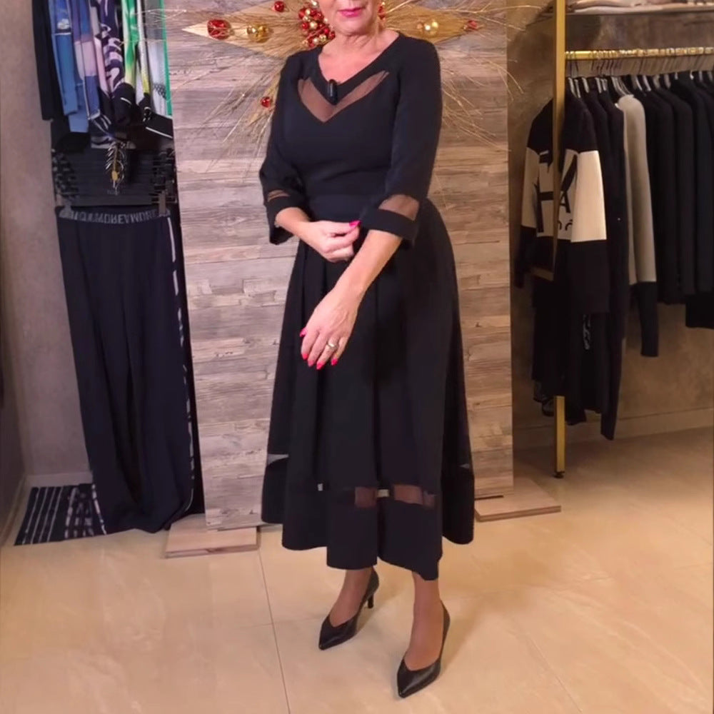 Women's fitted midi dress with transparent mesh inserts, tie belt and feminine A-line StylebySassy