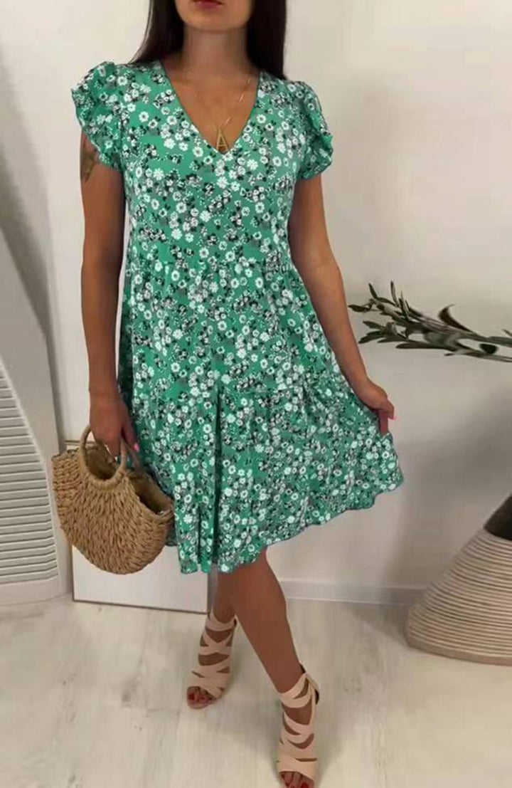 Ladies' V-neck tiered dress with puff sleeves and fitted underbust seam StylebySassy