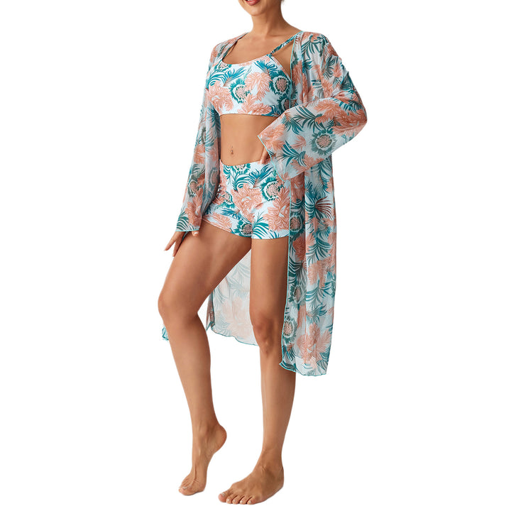 Women's beach outfit with floral design and transparent kaftan StylebySassy