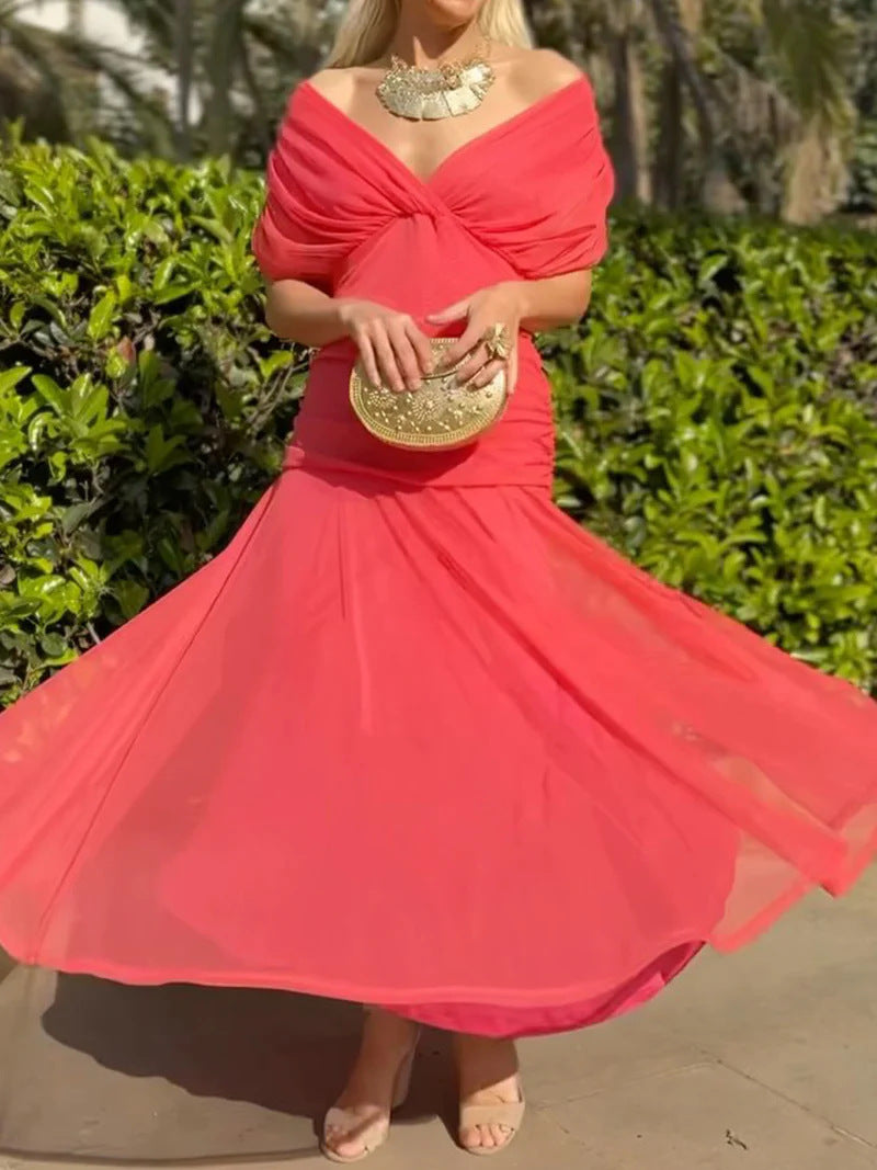 Ladies elegant floor-length evening dress with draped shoulder area and airy chiffon skirt StylebySassy