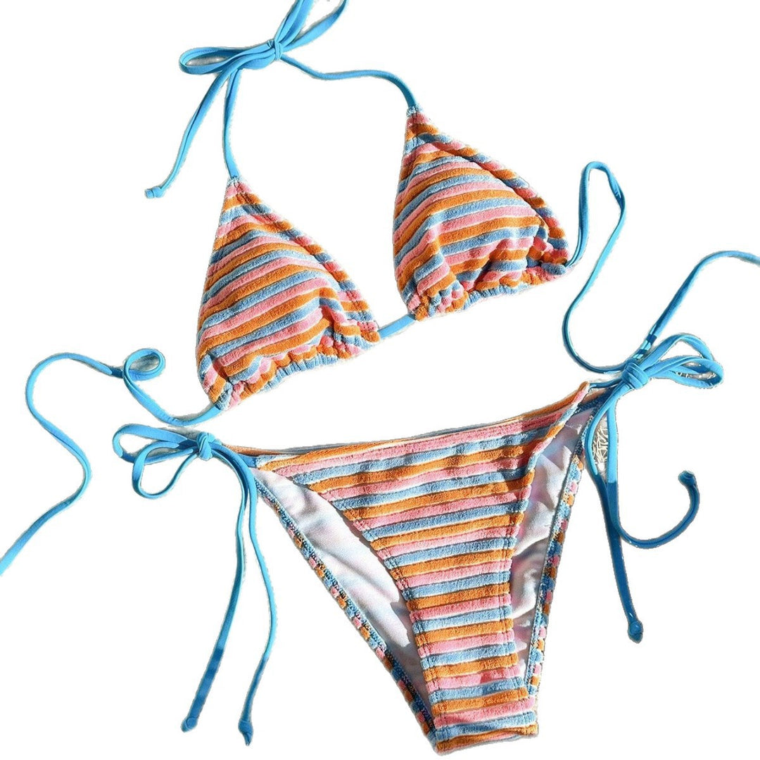 Women's bikini model with playful striped pattern StylebySassy