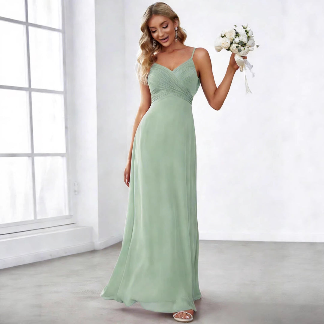 Ladies flowing chiffon evening dress with crossed draping, empire waist and fine spaghetti straps StylebySassy