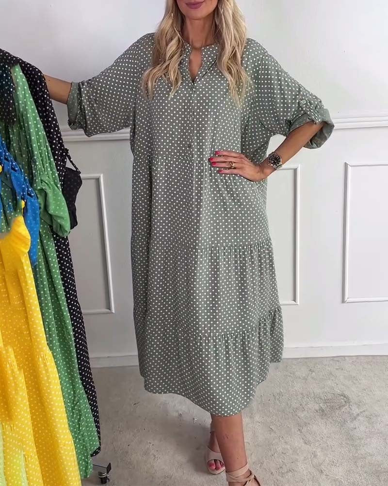 Women's lightweight flowing midi dress with polka dot pattern, tiered skirt and roll-up sleeves StylebySassy