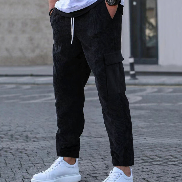 Men's tapered corduroy joggers with elastic drawstring waistband and patch flap pockets StylebySassy