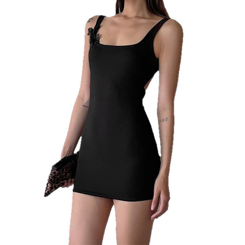Women Elegant form-fitting mini dress with floral accent StylebySassy