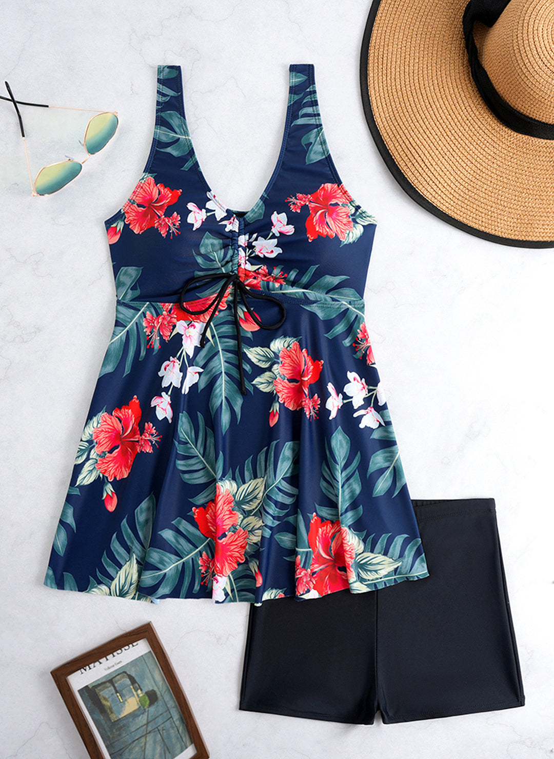 Ladies' tankini set with stylish ruffle and graphic peacock pattern StylebySassy