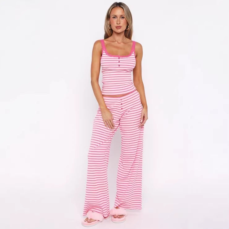 Women's pajama set with decorative button details and striped pattern StylebySassy