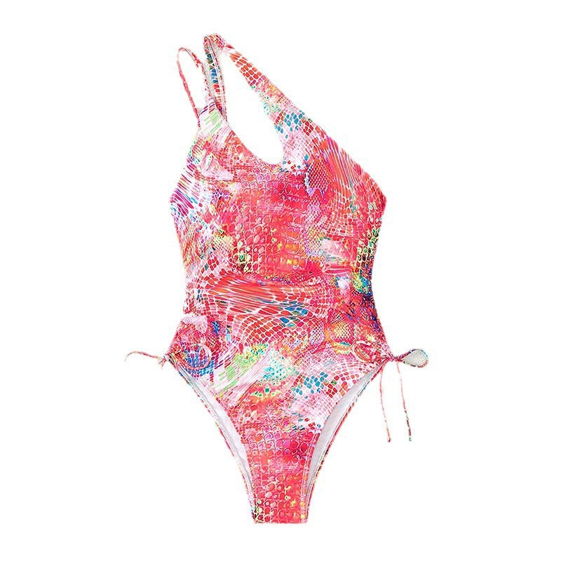 Women's one-sided swimsuit with sophisticated cut-out and vibrant pattern StylebySassy