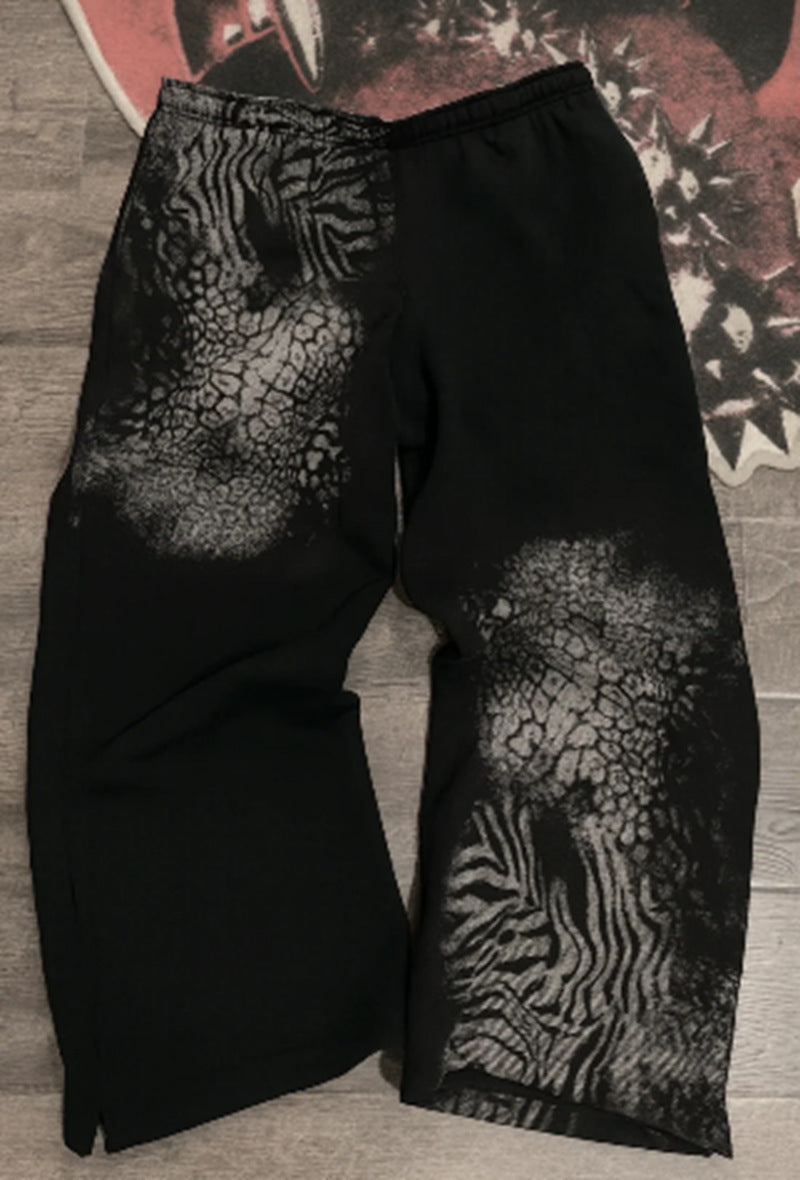 Women nan loose sweatpants with asymmetrical animal print, elastic comfort waistband and straight leg StylebySassy