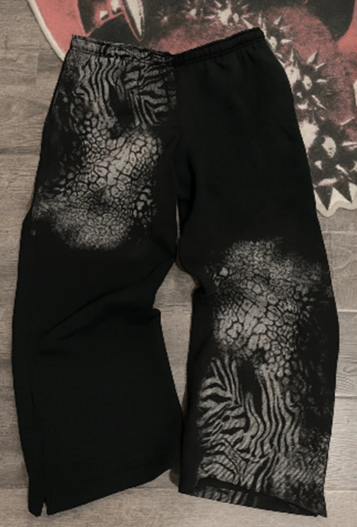 Women nan loose sweatpants with asymmetrical animal print, elastic comfort waistband and straight leg StylebySassy