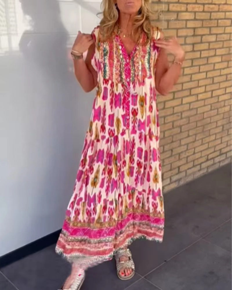 Ladies' flowing maxi dress in boho style with V-neck, tiered skirt and embroidered yoke StylebySassy