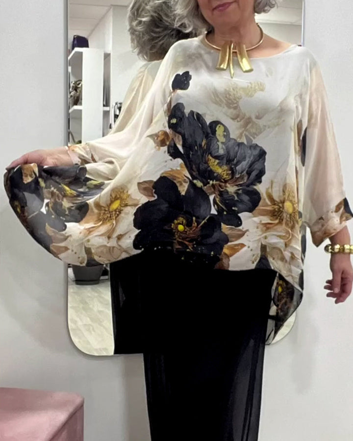 Women's airy chiffon tunic with bat sleeves, asymmetrical hem, and floral print StylebySassy