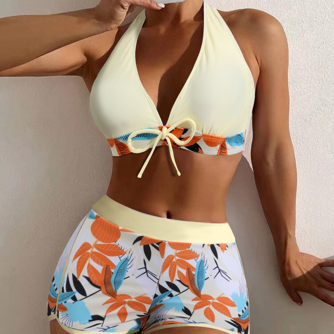 Women's sporty bikini set with adjustable halter top and shorts StylebySassy