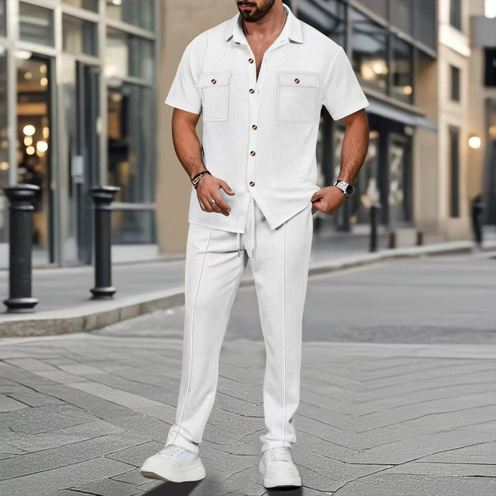 Men's casual two-piece set with open lapel shirt, chest pockets, and tapered drawstring pants StylebySassy