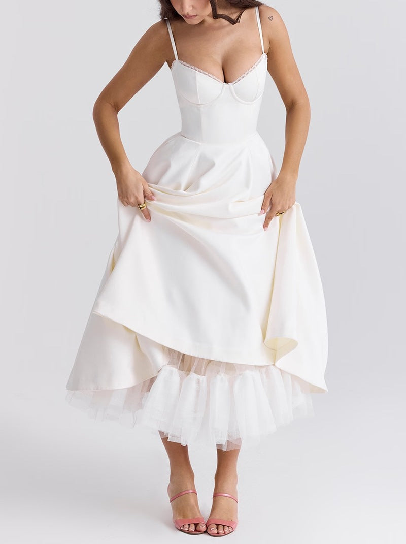 Ladies nan bustier dress with shaped bodice, soft flared skirt, integrated tulle underlay and side pockets StylebySassy